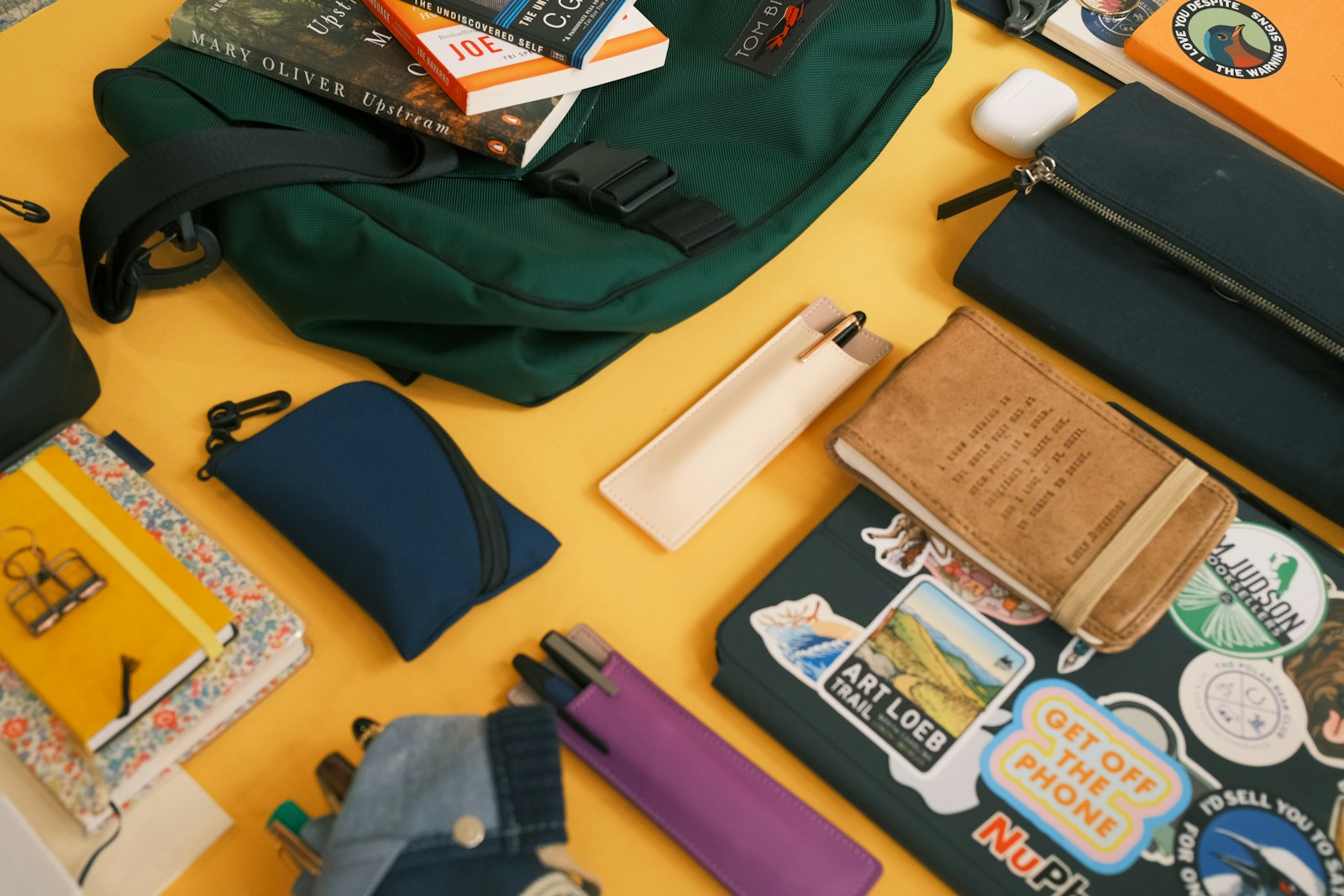 Emergency survival kit with water, food, first aid supplies, flashlight, radio, and packed gear ready for a storm or outage.