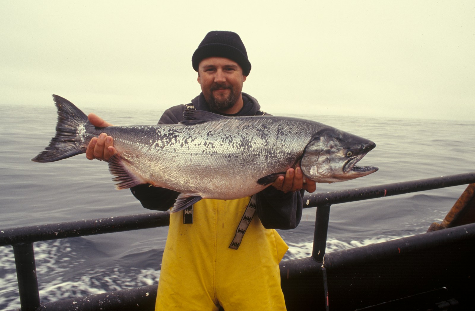 Angler fishing for Pacific salmon from a boat off the West Coast during the 2026 season