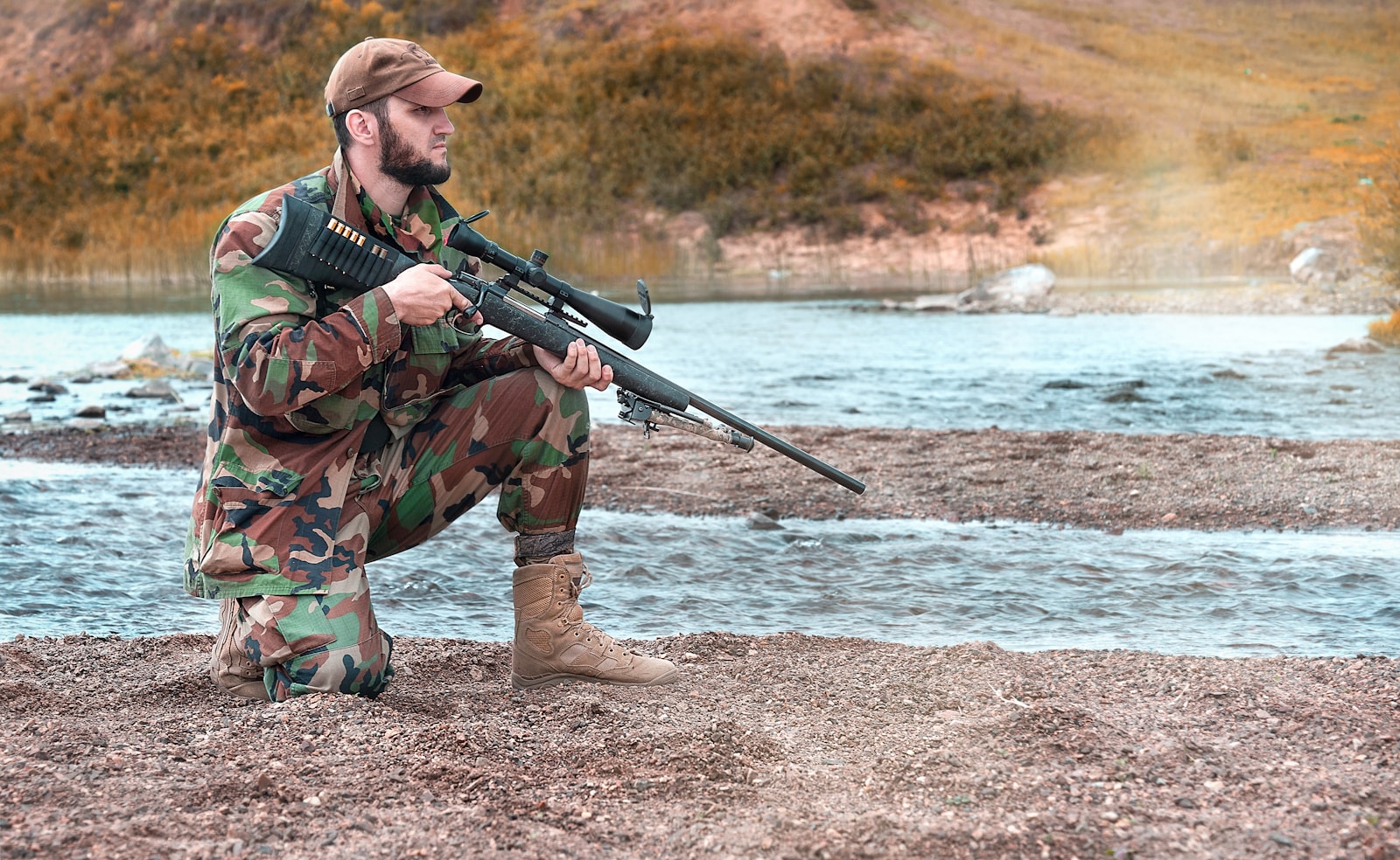 Deer hunter moving quietly through wooded cover while still hunting