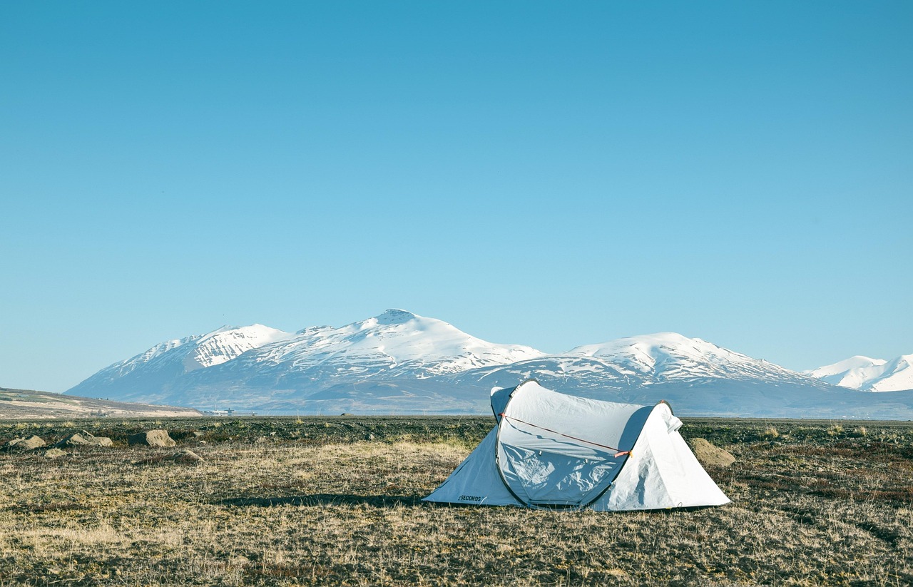 Camper set up at a quiet dry campsite without utility hookups