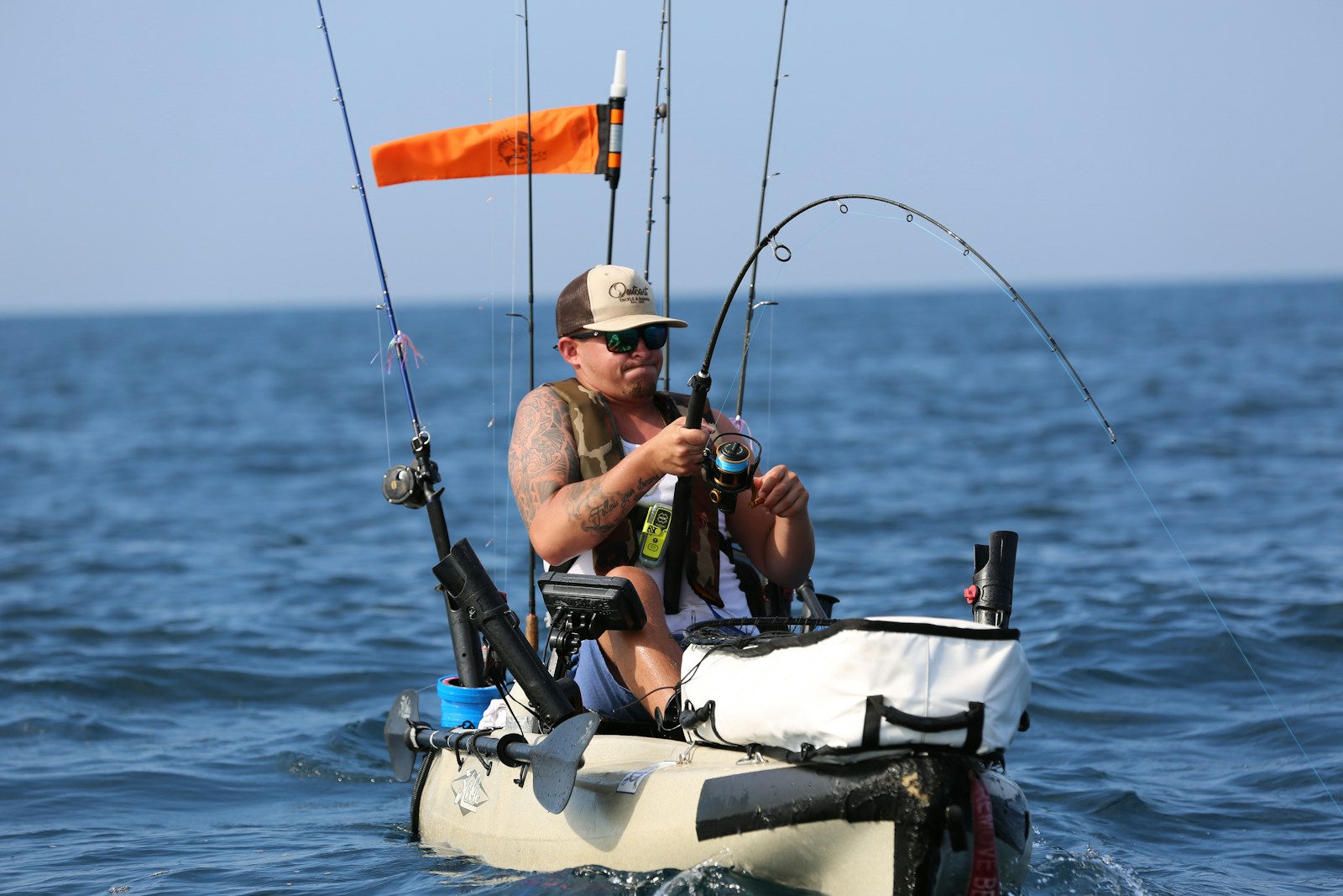 Angler preparing fishing gear after buying a state fishing license