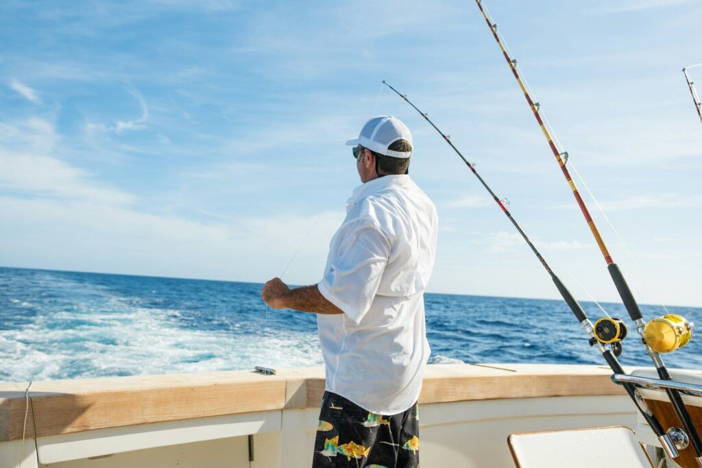 Charter fishing boat carrying anglers offshore during a morning fishing trip