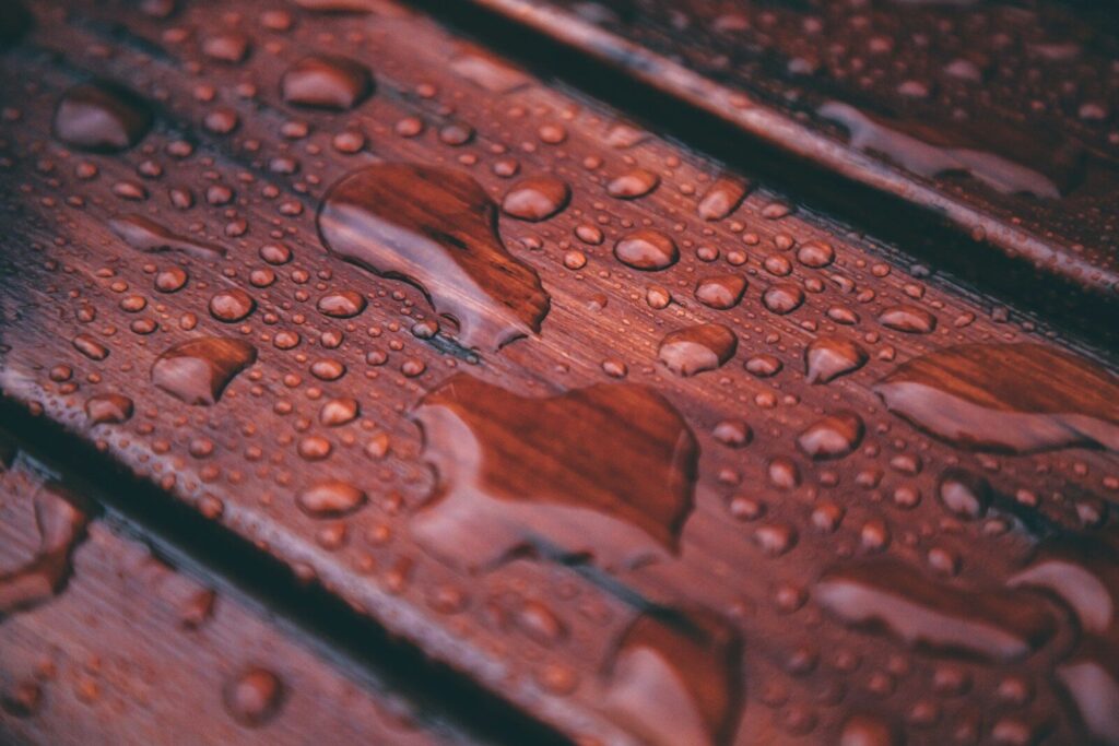 Outdoor gear repair with epoxy being prepared on a clean work surface before a protective finish