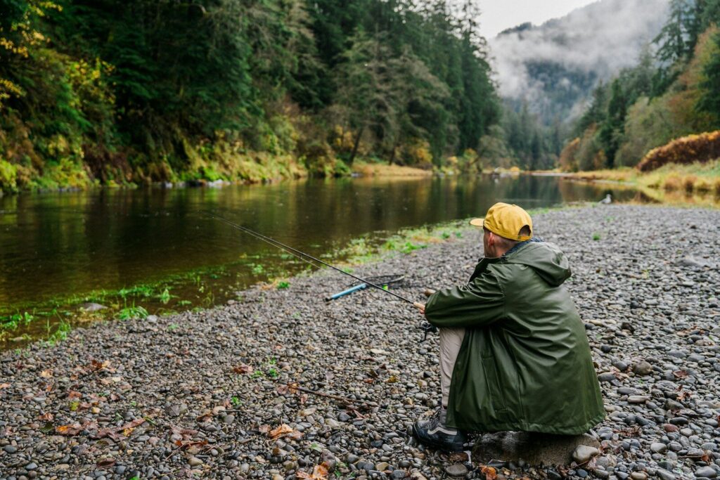 Oregon hunter and angler outdoors near public forest and river habitat